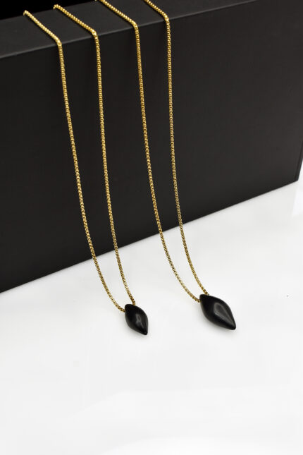 Necklaces Long necklace with a black asymmetrical element Eleven K Jewelry