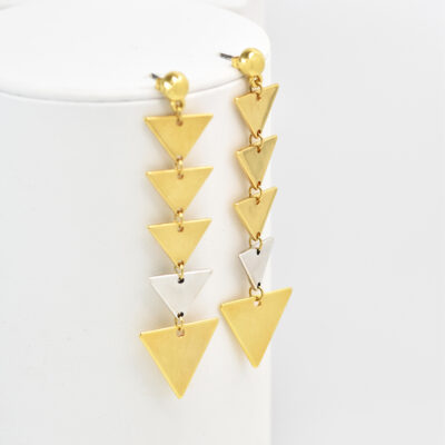 2 earrings with gold and silver triangles
