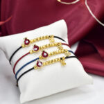 Βραχιόλια Γούρι 2026 βραχιόλι με κόκκινο σμάλτο & μαύρο βελούδινο κορδόνι Eleven K Jewelry