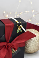 Bracelets 2026 Lucky Charm Cord Bracelet with Enamel Snowflake or Mistletoe Pendant Eleven K Jewelry