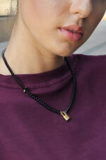 LEVEL K LOCK – Γυναικείο κολιέ με μαύρη αλυσίδα και χρυσό λουκέτο από ανοξείδωτο ατσάλι Eleven K Jewelry